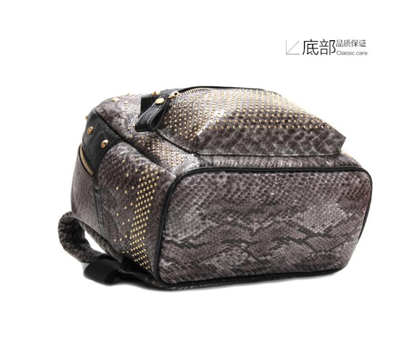 Mssefn新款韩版潮女双肩包包朋克蛇纹铆钉时尚书包休闲旅行包81535