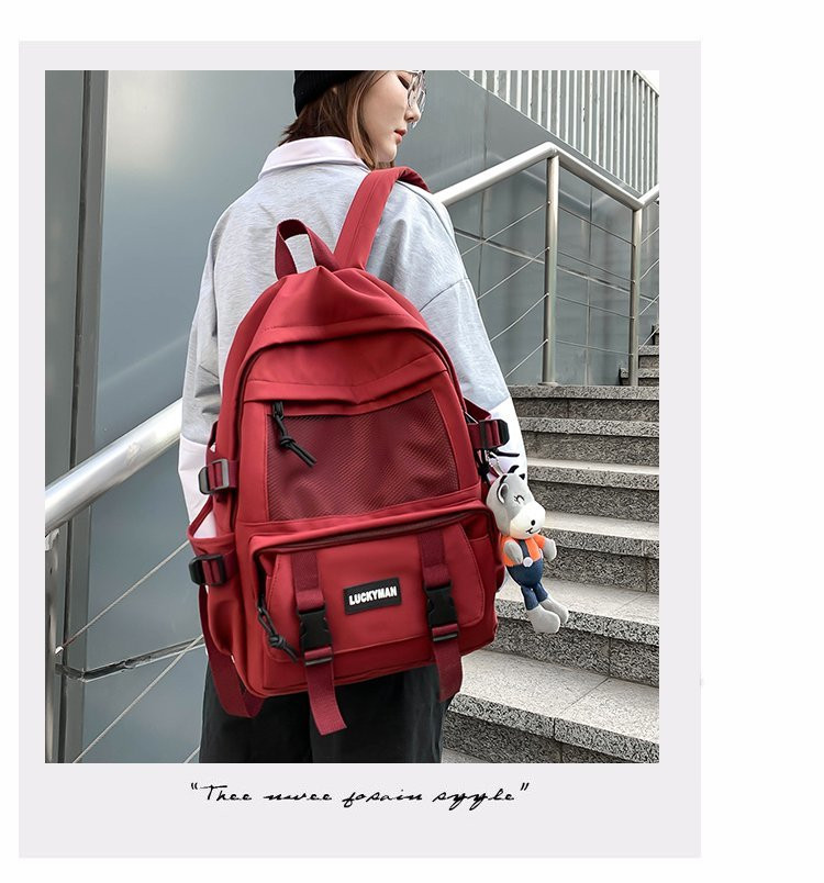 男双肩包休闲简约大容量韩版高中学生书包女时尚潮流帆布旅行背包