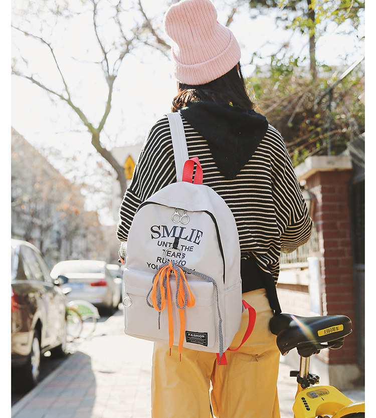 迪阿伦 韩版新款女士背包时尚简约字母印花纯色女生双肩包户外旅行背包