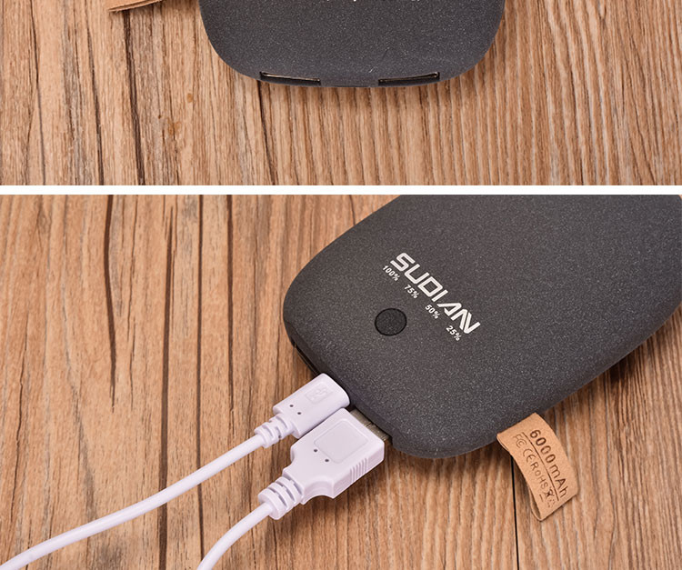 鹅卵石移动电源6000毫安充电宝磨砂质感双USB输出超小便携