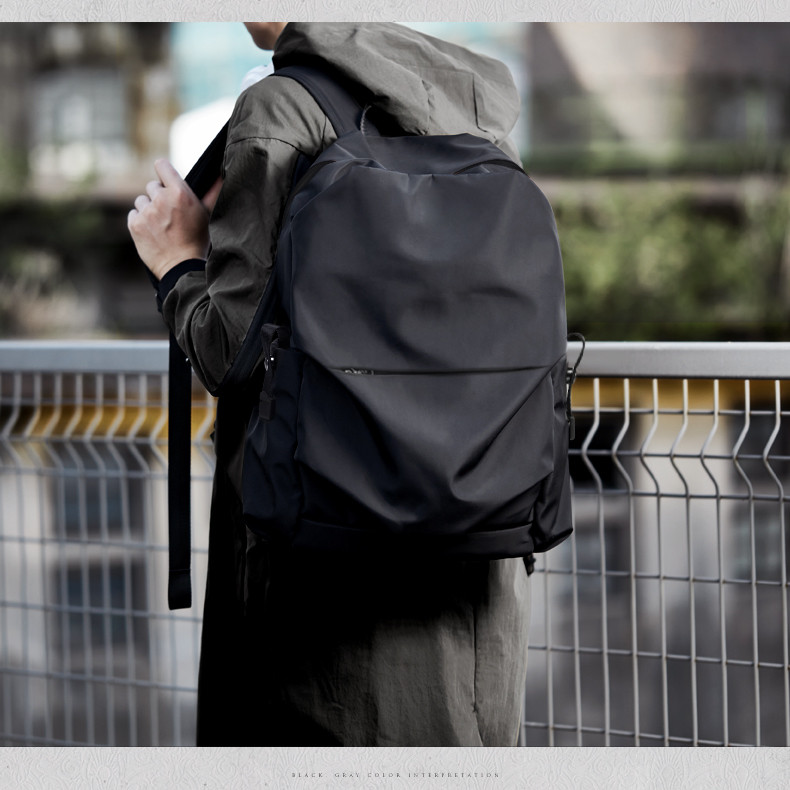 纪蔻 简约双肩包男时尚潮流休闲大学生书包轻便旅行背包男士商务电脑包