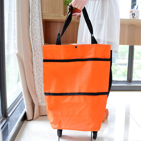 普润 收纳-牛津布折叠两用拖轮包（橙色）。图片