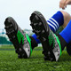 启言 专业猎鹰女孩足球鞋女款儿童草地比赛训练专用中小学生长钉碎钉鞋